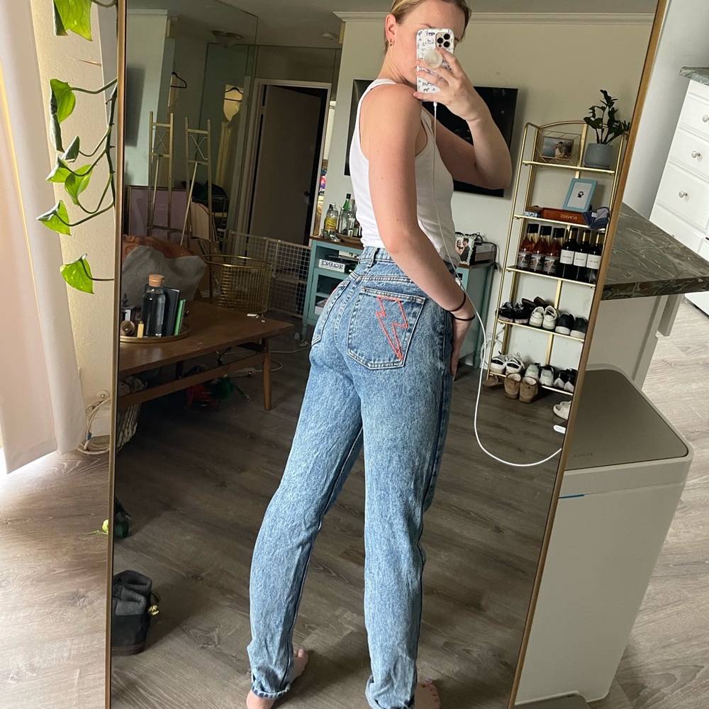 American apparel high waisted jeans with lightening bolt embroidery.